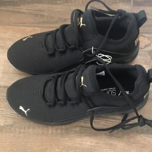 Puma black sneakers
